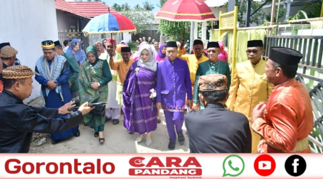 28 Prosesi adat Gorontalo bagi Camat Marisa, Usman Hadis Bay, bersama istri, Rosdiana Talib, S.Pd, berlangsung khidmat pada Minggu (12/10/2025).