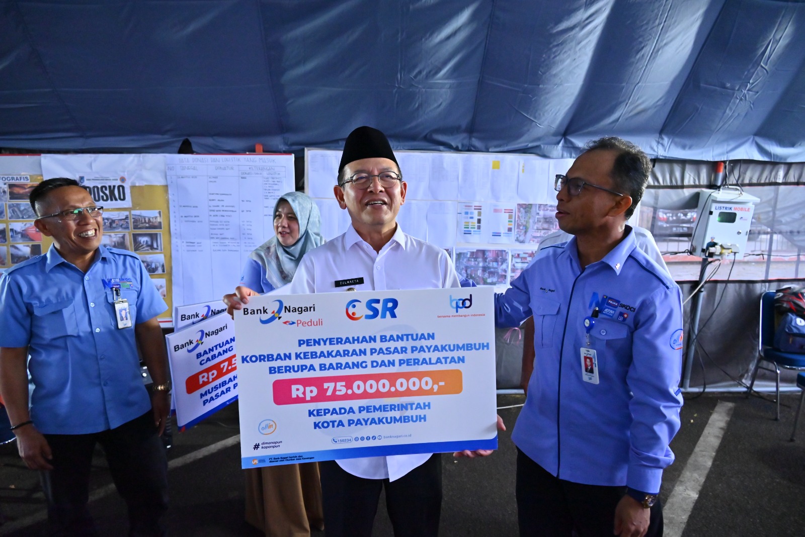 28 Pemko Padang dan Baznas Salurkan Bantuan Rp182 Juta untuk Pemulihan Pasar Payakumbuh